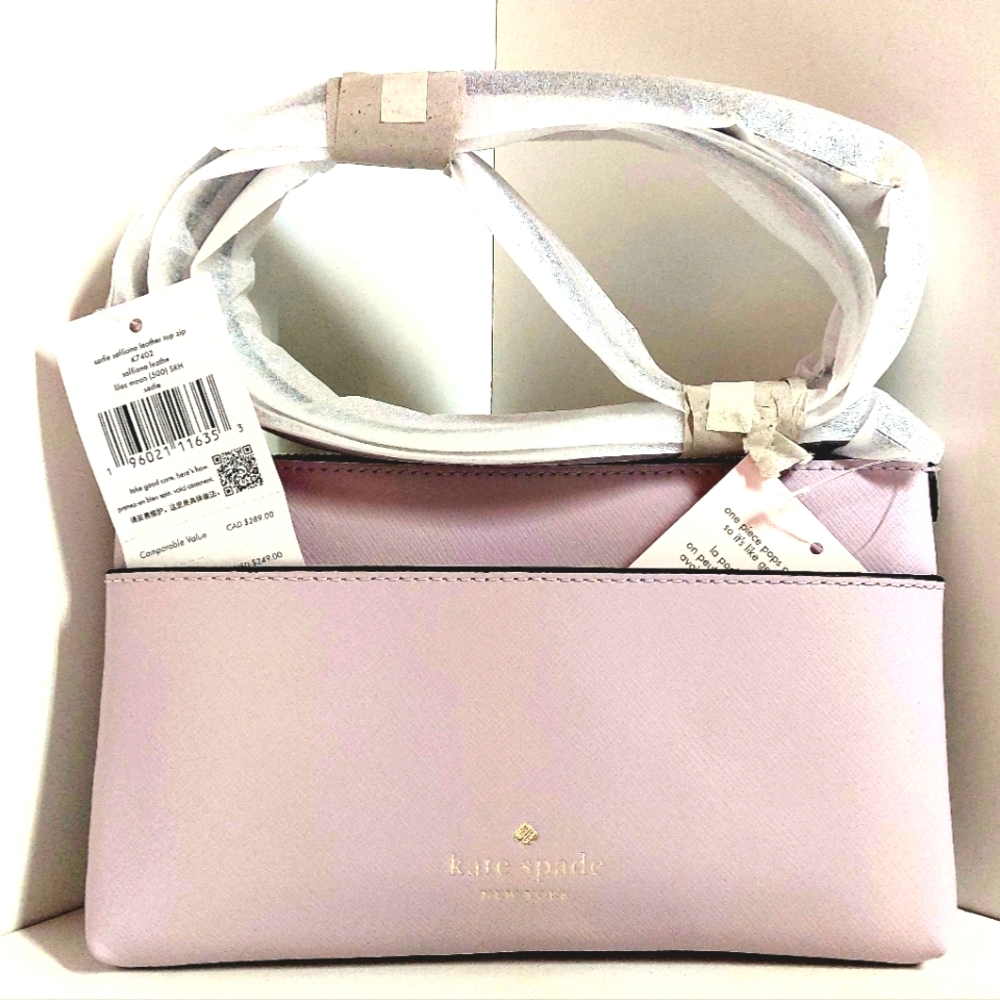 Nwt kate spade sadie xbody set. Lilac in color.